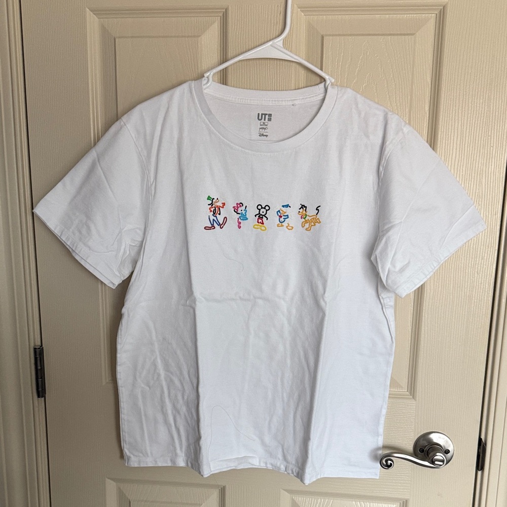 Uniqlo White Short Sleeve Tee with Small Multicolor Cartoon Motif